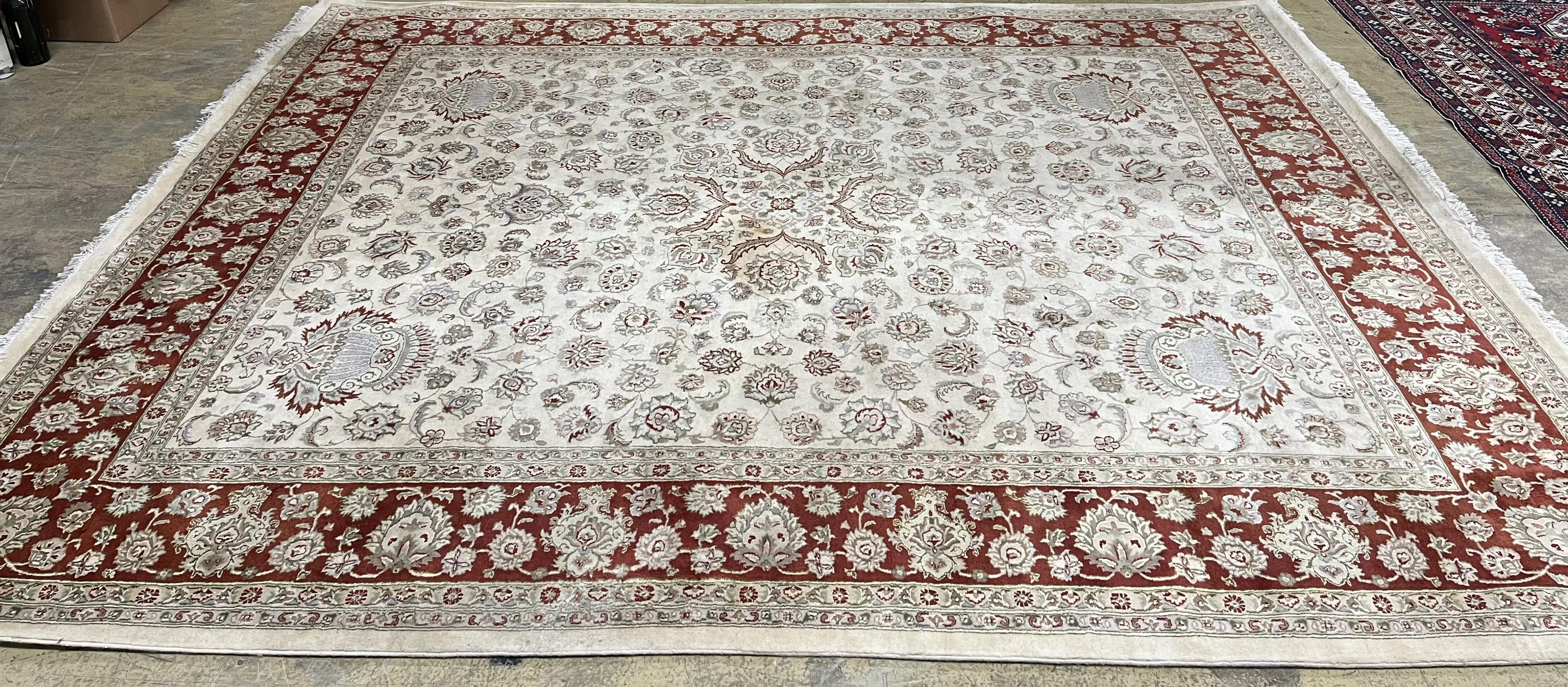 A Ziegler style ivory ground carpet, 320 x 274cm. Condition - fair to good